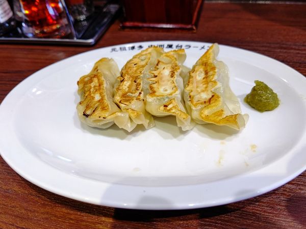 「Bセット(ミニスタめし+餃子4個)500円の餃子4個」@元祖博多中洲屋台ラーメン 一竜 渋川店の写真