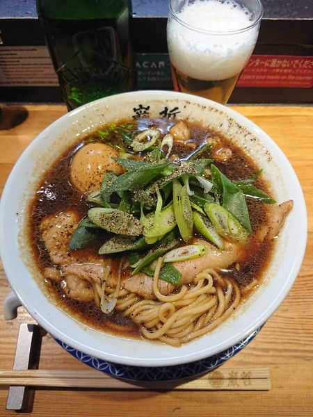 「ビール＋マルチョウそば＋半熟煮玉子」@ラーメン 巌哲の写真