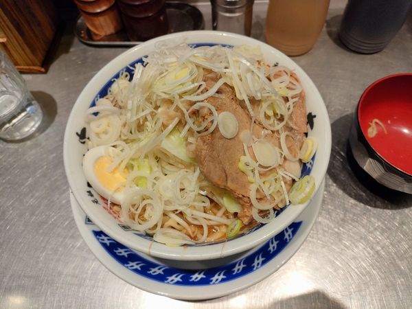 「少なめ烈らーめん　+ネギ　野菜多め、アブラ少なめ」@らーめん大 蕨店の写真