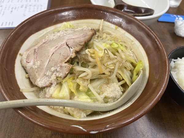 「特製野菜味噌ラーメン背油半ライスホルモン炒めハーフ」@ラーメン 東横 笹口店の写真
