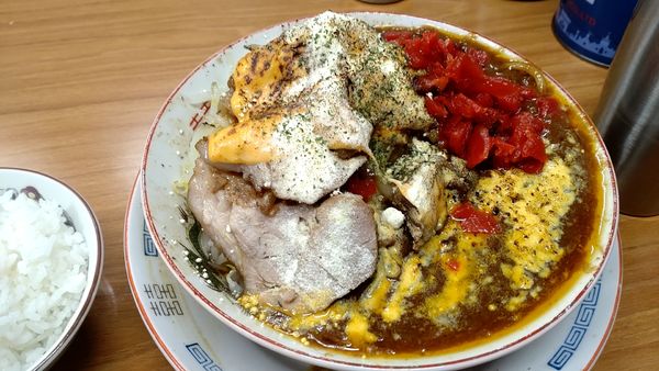 「漢の焼きチーズ豚カレー麺　900円+豚1枚　100円」@らーめん漢道の写真