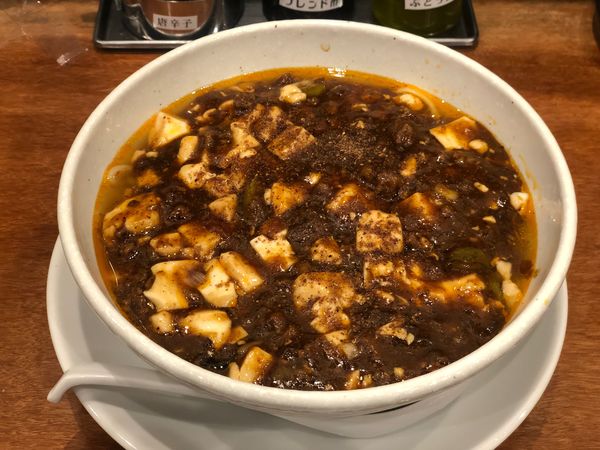 「麻婆麺」@SHIBIRE-NOODLES 蝋燭屋 京橋エドグラン店の写真