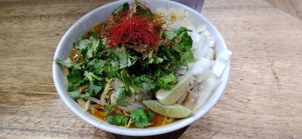 「トムヤムラーメン少なめ+たまねぎ、ライム、パクチー」@MEN YARD FIGHTの写真