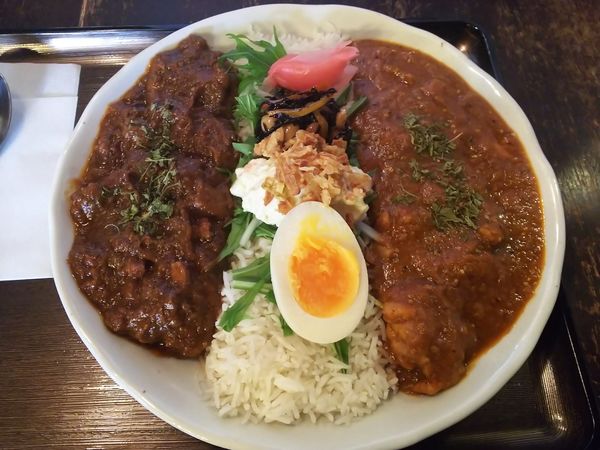 「2種あいがけカリー(ポークビンダル+チキン) 1100円」@煮干結社 弘前店の写真