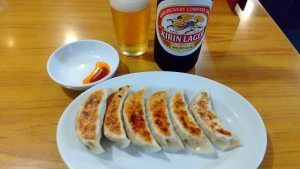 「キリンラガー・中瓶+餃子(¥550+500)」@中華 光陽楼の写真