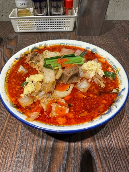 「辛スタミナラーメン(3辛)+生卵」@スタミナラーメンのかたの写真