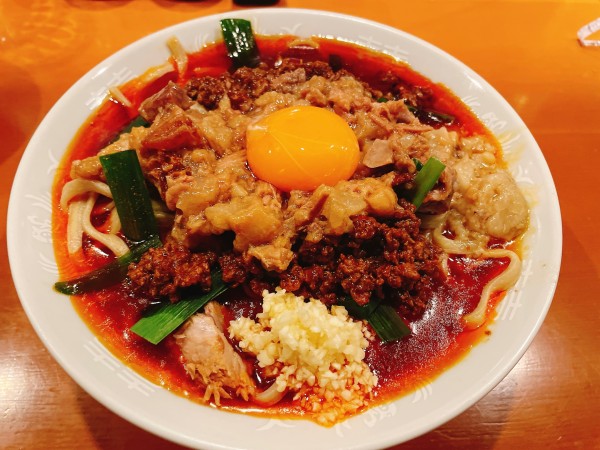 「【限定】台湾ラーメン+生卵+味付き脂+生卵」@麺屋 長次郎の写真