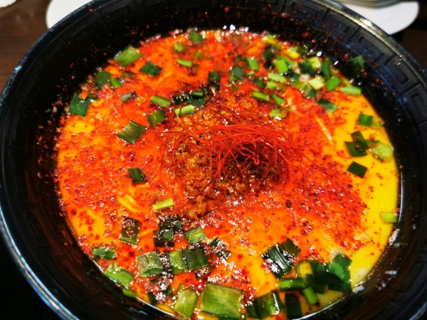 「ブラック台湾ラーメン」@濃厚とんこつラーメン 壱角堂 池袋西口店の写真