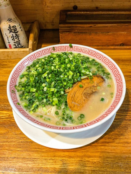 「豚骨ラーメン+ネギ」@らーめん達の写真