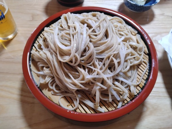 「大根そば+イカ天+大瓶ビール」@日の本家の写真