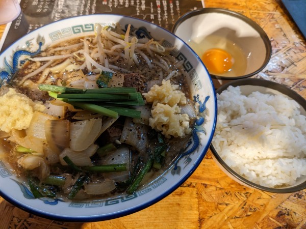 「スタミナラーメン+ライス生卵セット」@スタミナラーメンのかたの写真