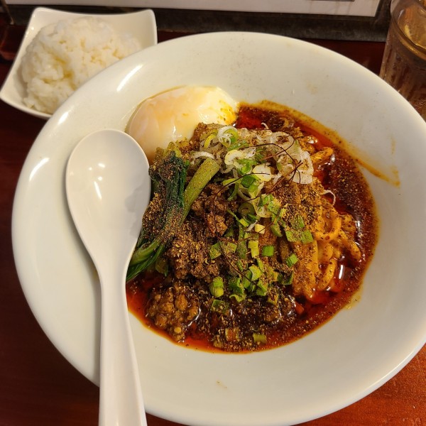 「汁なし担々麺(辣3·麻3)+温玉+追い飯」@noodles house 錦鯉の写真