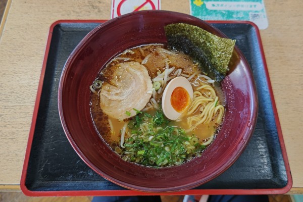 「プレミアム黒にんたまラーメン」@にんたまラーメン ゆにろーず 大阪トラックステーション店の写真
