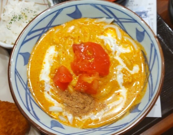 「冷やしトマタマカレーうどん豆乳仕立て」@丸亀製麺 山形店の写真