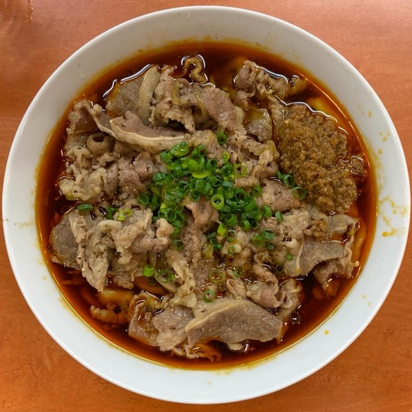 「ギュウロウメン ¥1,200 辛口 ¥100 麺大盛 ¥50」@日陰の写真