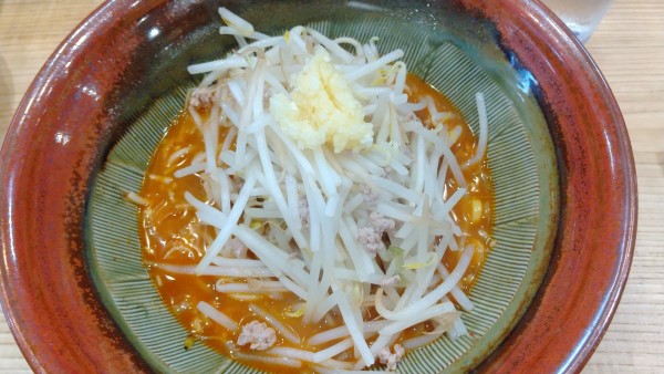 「味噌らーめん+にんにく(麺軽め・スープ少なめ・辛さ控えめ)」@らーめん 高尾の写真