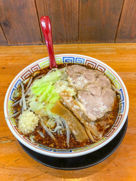 「山椒辛味噌+マー油+豚一枚」@麺屋 登夢道 茅ヶ崎本店の写真
