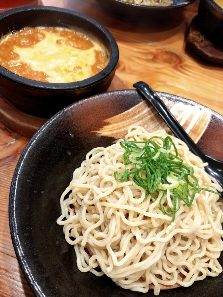 「ぴり辛石焼豚骨つけ麺」@東昇軒の写真