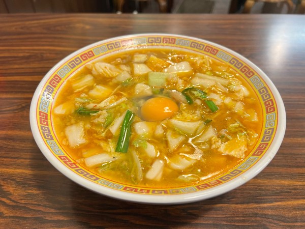 「スタミナラーメン＋生たまご」@天理スタミナラーメン 本通り店の写真