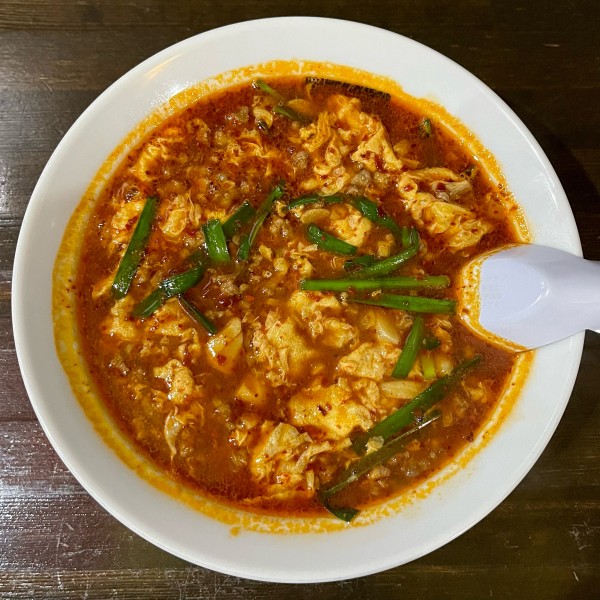 「トマト辛麺 ハーフ 5辛（850円）」@辛麺屋 物語の写真