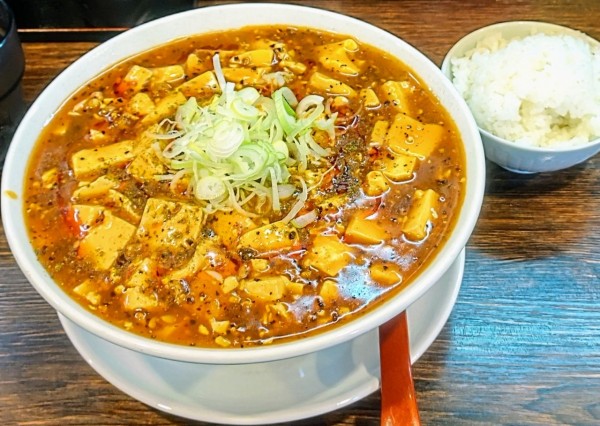 「麻婆豆腐麺ちょい辛め (刀削麺)大盛」@元祖打卤麺 香辣居 8号店の写真