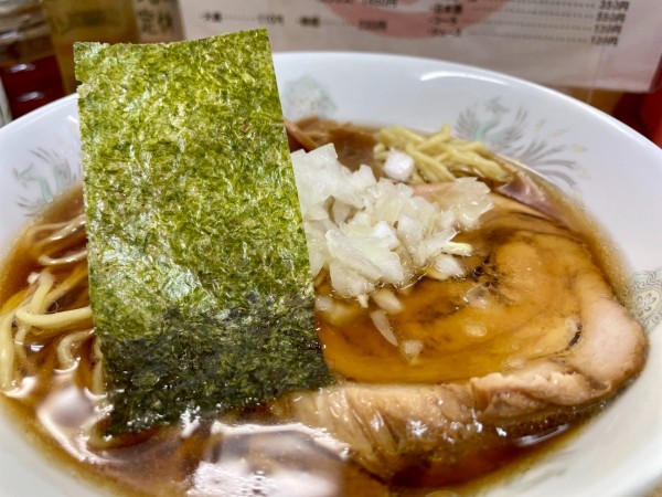 「スーパードライ＋多満自慢（熱燗）＋メンマ皿→ラーメン（卵麺）」@丸幸の写真
