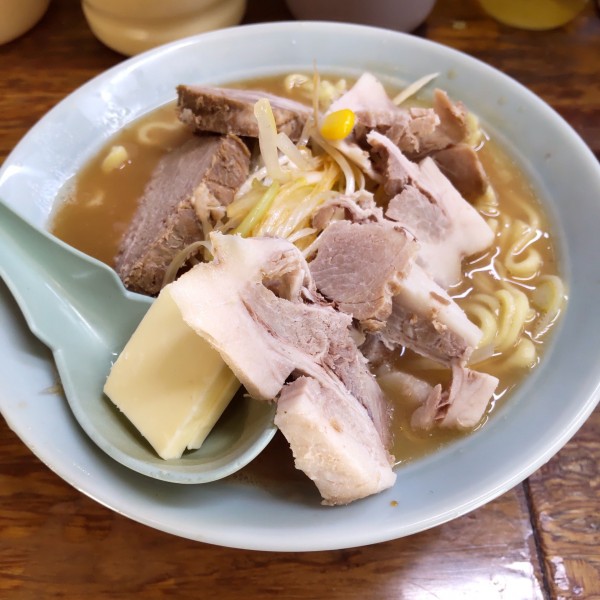 「ネギ味噌チャーシューメン（￥1,300）＋バター入（￥100」@まこと家の写真