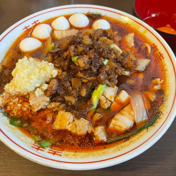 「辛スタ満ソバ うずら 生卵」@つけ麺 弥七の写真