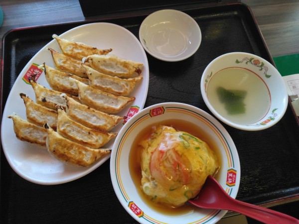 「餃子2人前＆ジャスト天津飯(1人前無料と7%引きで590円)」@餃子の王将 東大曽根店の写真