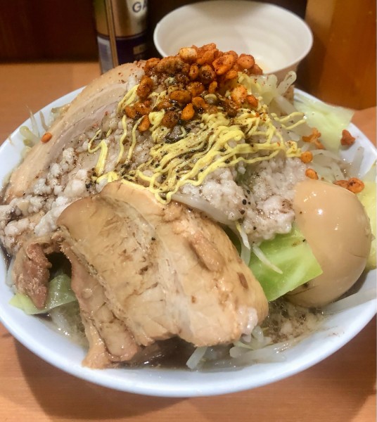 「特製ラーメン 生卵 1050+60円」@らーめん忍者の写真