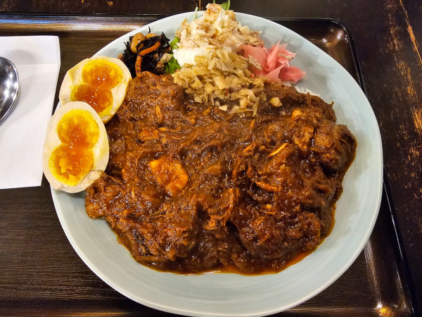 「トマトポークカリー 900円」@煮干結社 弘前店の写真