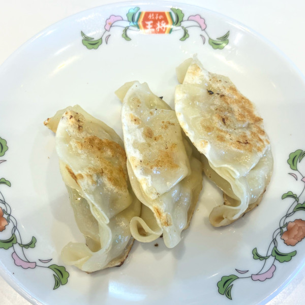 「にんにく激増し餃子187円ジャストサイズメニュー他」@餃子の王将 千葉ニュータウン中央店の写真