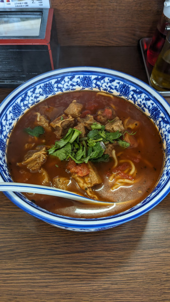 「トマトと牛肉ラーメン」@独一処餃子 堀切店の写真