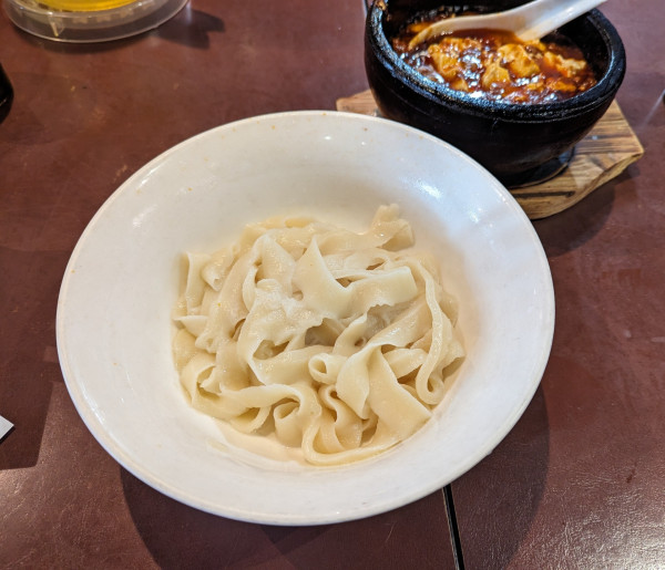 「頂天石焼麻婆刀削麺」@陳家私菜 新宿店の写真