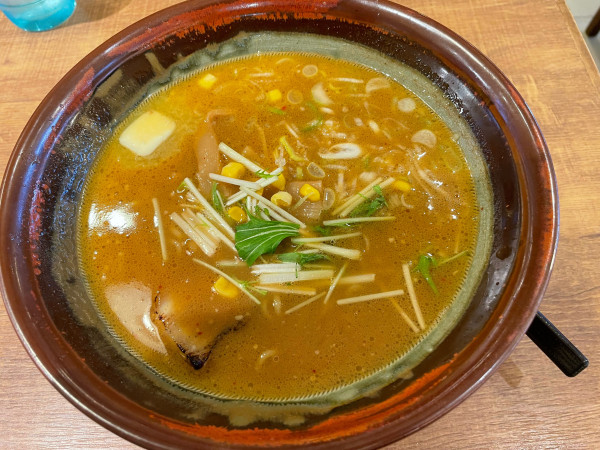 「炙り濃コク味噌バターコーンラーメン¥1,155」@小樽 ニュー三幸 新千歳空港店の写真