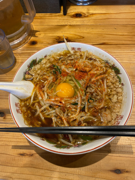 「尾道スタミナラーメン生卵トッピング」@ぶらっくラー麺 しょうや 神辺店の写真