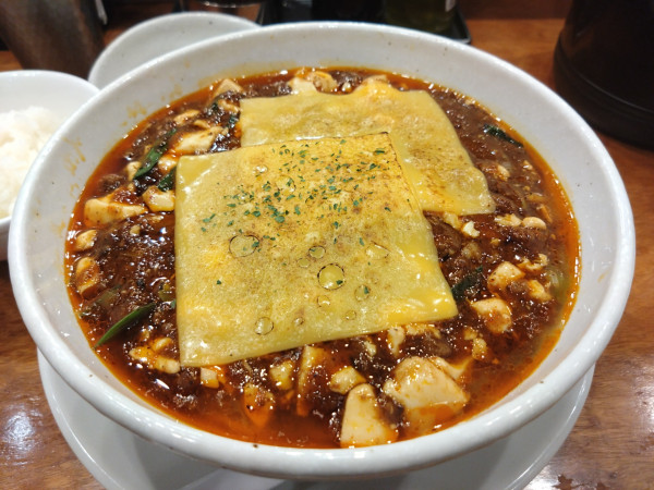 「焼きチーズ麻婆麺 4辛」@SHIBIRE-NOODLES 蝋燭屋 京橋エドグラン店の写真