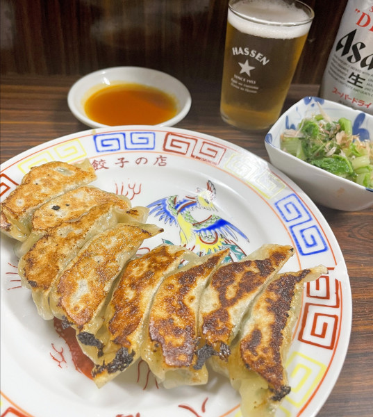 「焼餃子 580円 + ビール 620円 + サービス料10%」@八仙の写真