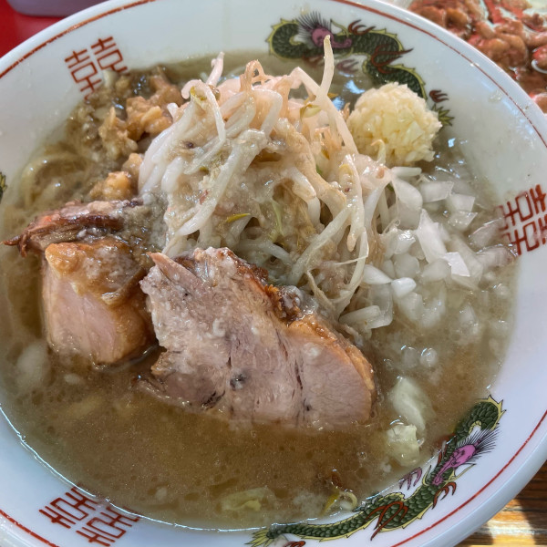 「ラーメン（豚2枚）1,000円 豚入りアブラ 100円 生玉子」@ラーメン金剛の写真