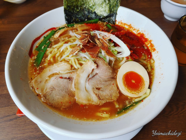 「赤スタミナにんにくラーメン(990円)」@やまがたらーめん きたもと屋の写真
