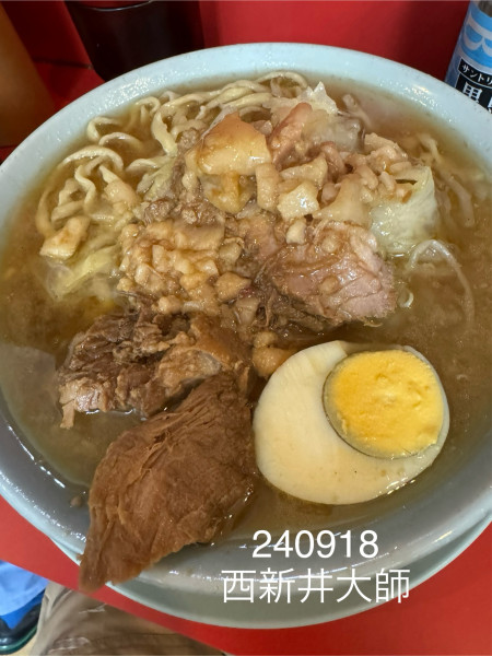 「ラーメン半分＋生玉子　1,050+100」@ラーメン富士丸 西新井大師店の写真