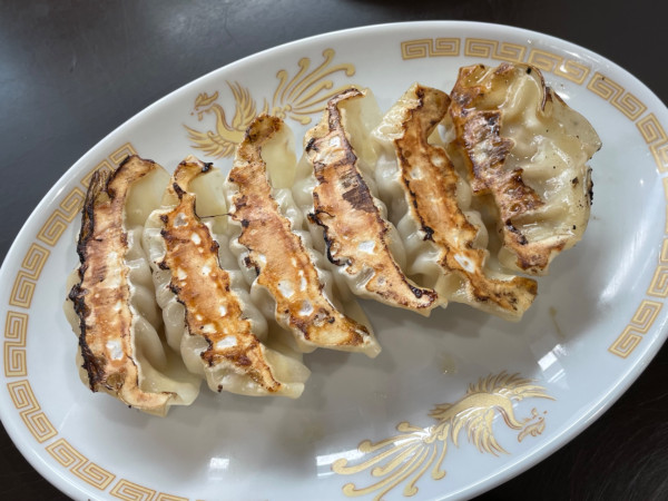 「焼き餃子　￥３８０」@中華料理 栄徳の写真