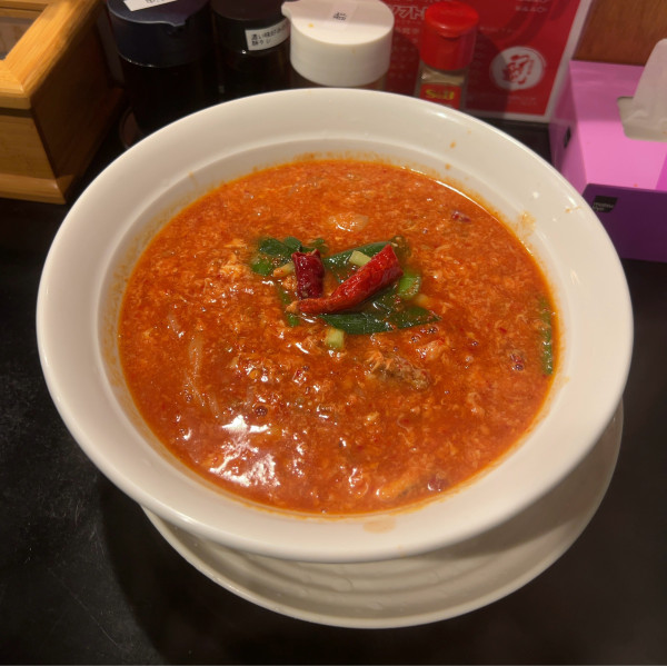 「トマト辛麺10辛 こんにゃく麺 シーフード 石焼きご飯」@岡山辛麺 つるっと亀の写真