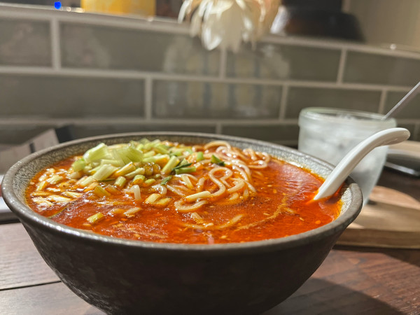 「汁あり担々麺三辛テイクアウト」@赤麺 梵天丸 五日市本店の写真
