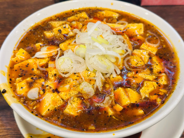 「マーボー麵 刀削麺 860円」@元祖打卤麺 香辣居 8号店の写真