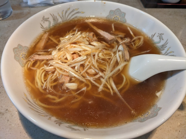 「チャーシュー入りネギラーメン」@龍華の写真