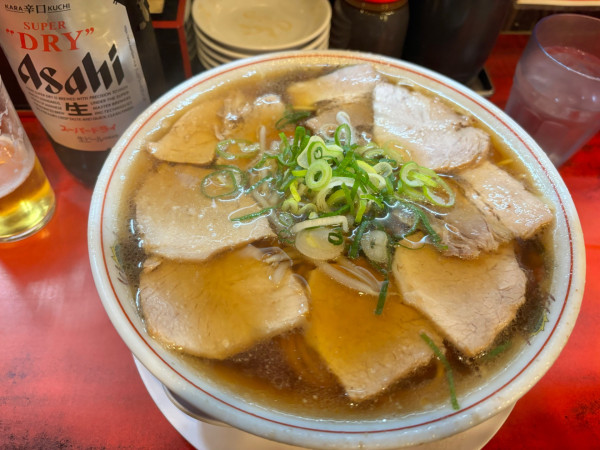 「アサヒスーパードライ大瓶〜特製ラーメン」@本家第一旭 たかばし本店の写真