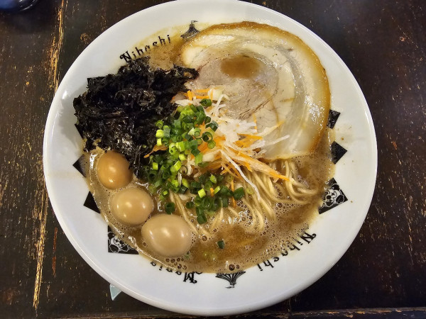 「【限定】ホタルイカ煮干蕎麦　1200円」@煮干結社 弘前店の写真