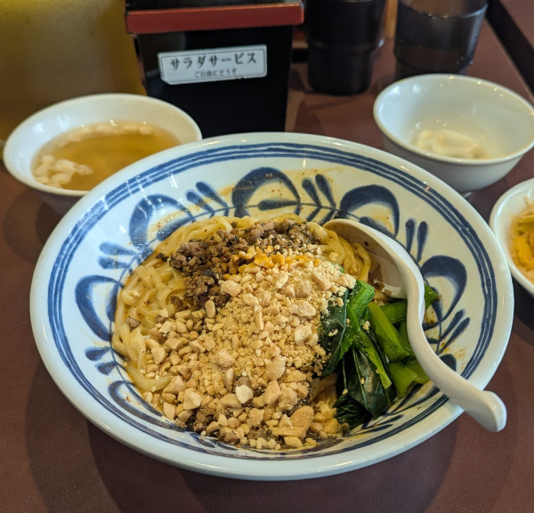 「汁無し担々麻辣刀削麺」@陳家私菜 新宿店の写真