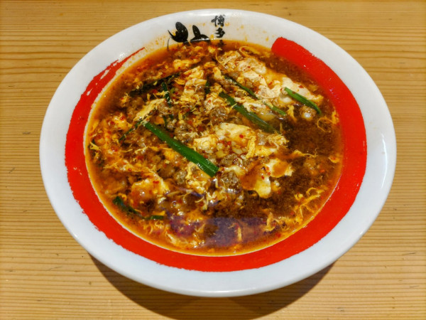 「黒辛麺 2辛 ニンニク有 韓国麺 920円」@博多辛麺 狛虎 博多デイトス店の写真